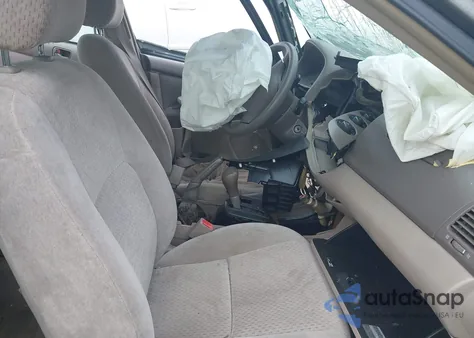 2003 Toyota Camry Le z USA, uszkodzony, nr VIN 4T1BE32K23U686920